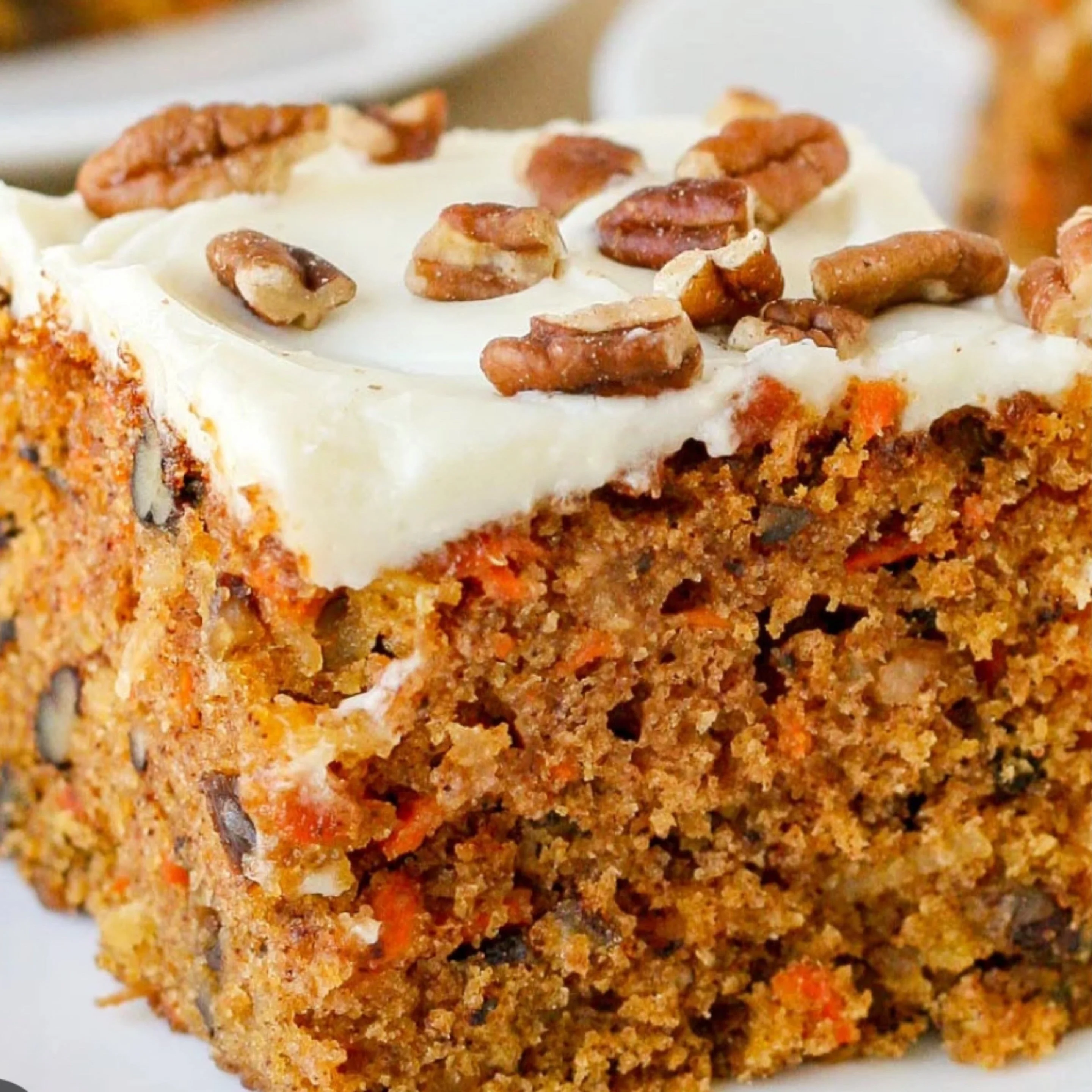 Frosted cake decorated with nuts